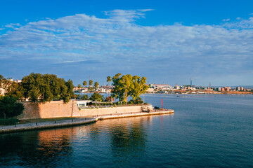 Fototapeta premium Old town of Taranto with metallurgical industry in the background