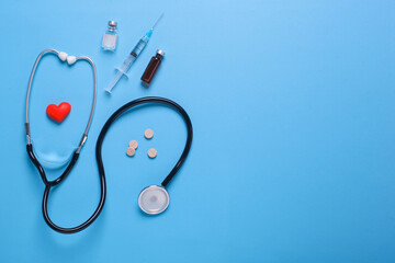 Creative flat lay composition of world health day on pastel blue background with copy space