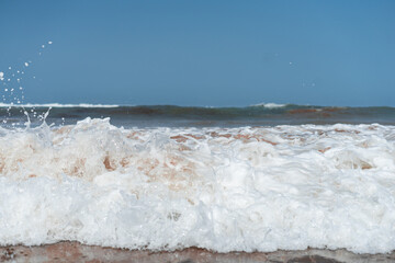 Sea-level photo of the ocean's white foam
