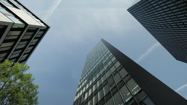 Financial district towers. Business office towers and collected in a database. Day, skyscrapers and office buildings. Drone shot. Architecture concept.