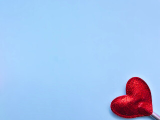 Red heart on blue background