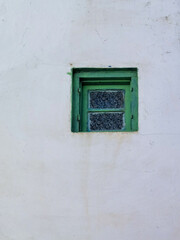 Obraz na płótnie Canvas Green wooden window in the old medina of Asilah