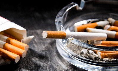 Composition with an ashtray and cigarettes