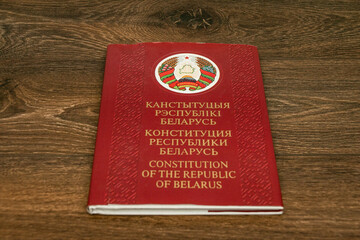 Minsk. Belarus. 05.02.2022. Constitution of the Republic of Belarus on a wooden background. Basic...