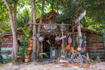 Fototapeta na wymiar Rastaman wooden house on the tropical beach in island Koh Phangan, Thailand
