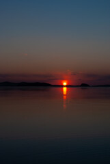 Fototapeta na wymiar Blurred focus. Winter sea. Sunset on the sea.