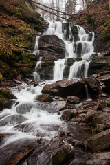 Fototapeta premium Shypit is a waterfall is located on the Pylypets River, about 6 kilometers from the village of Pylypets, Mizhhiria Raion, Zakarpattia Oblast of western Ukraine The waterfall is 14 meters high.