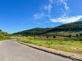 a road on an island with a clear sky