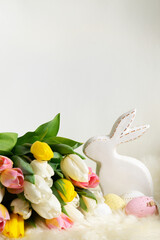 Fototapeta na wymiar Egg hunt with Easter white bunny