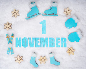 November 1st. Sports set with blue wooden skates, skis, sledges and snowflakes and a calendar date. Day 1 of month.