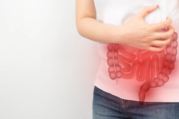 Woman suffering from abdominal pain with small and large intestines organ shape. Digestive tract...