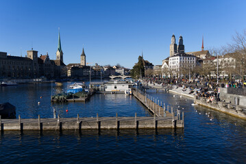 Fototapeta premium Skyline of the old town of Zürich on a sunny winter afternoon with river Limmat in the foreground. Photo taken February 5th, 2022, Zurich, Switzerland.