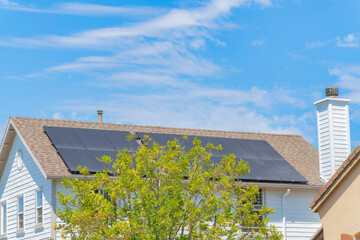 Solar panels on the shingles roof of a house at Ladera Ranch in South California