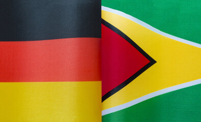 fragments of the national flags of Germany and the Republic of Guyana close-up