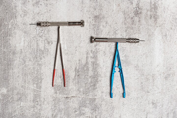 Set of iron scrapers with coin tweezers. Mechanical cleaning of coins and archaeological items.