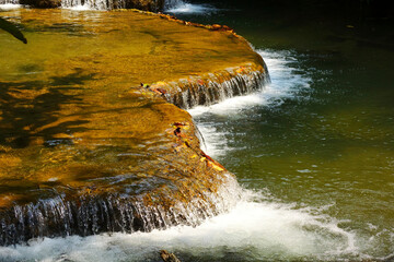 Water flows down the different levels in the Mae Khamin creek. Kanchanaburi Province, Thailand