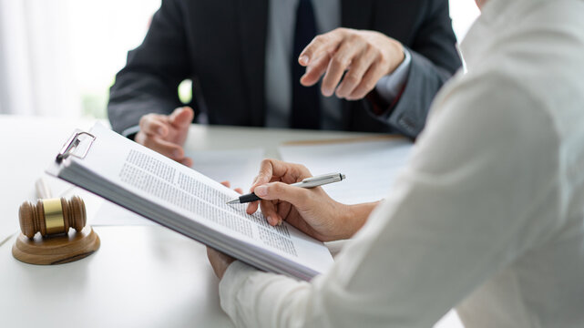 Law Concept The Lawyer Partner Who Wears Simple White Shirt Attempting To Catch Up And Write Down From What Her Boss Says