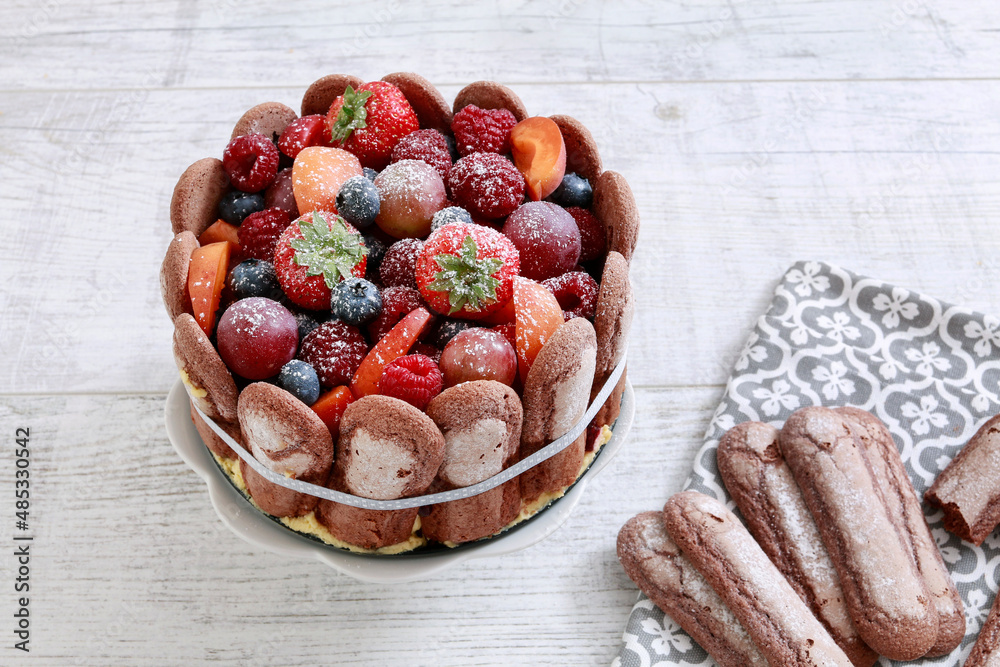 Wall mural French charlotte cake with summer fruits.