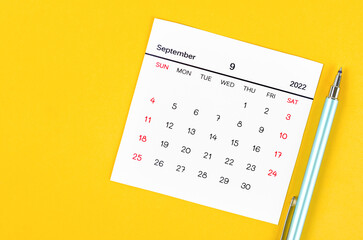 September 2022 calendar on yellow background.