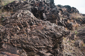 Fototapeta premium Granite iron cut - stone quarry, rock texture closeup Industrial material for construction