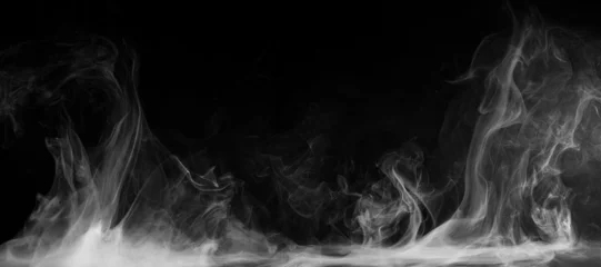 Wall murals Smoke Abstract colored smoke moves on black background. Mystical swirling smoke rolling low across the ground.