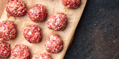 meatballs raw meat beef pork chicken fresh portion dietary healthy meal food diet still life snack on the table copy space food background rustic top view keto or paleo diet