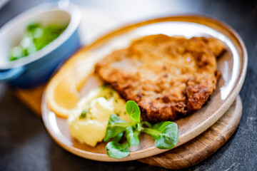Pork breaded cutlet coated with breadcrumbs with mashed potatoes