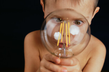 Boy with a light bulb