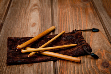 Four bamboo sticks to massage the face and other parts of the body.