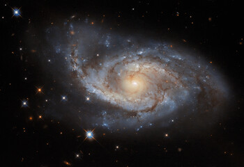 ESA/Hubble: Sail of Stars. The spiral arms of the galaxy NGC 3318.
