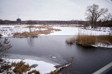 Black smoke, in a village landscape.