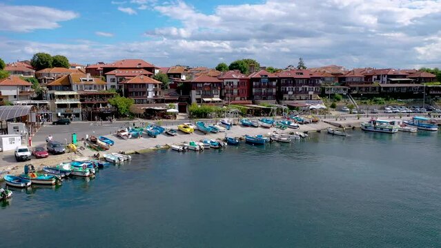 Boats and houses in northern part of old town of Nesebar historic city on Black Sea shore in Bulgaria
