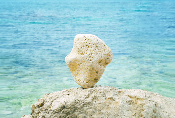Stone balance on a sea shore. Conceptual background