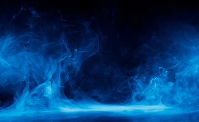 Cercles muraux Fumée Abstract blue smoke moves on black background. Swirling smoke.