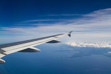 Fototapeta na wymiar View from airplane window, wing