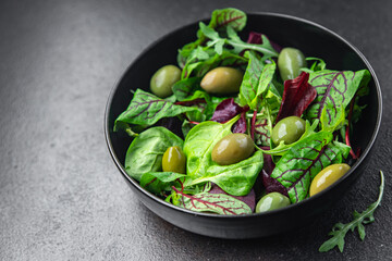 olives green salad fresh portion dietary healthy meal food diet still life snack on the table copy space food background rustic top view keto or paleo diet veggie vegan or vegetarian food
