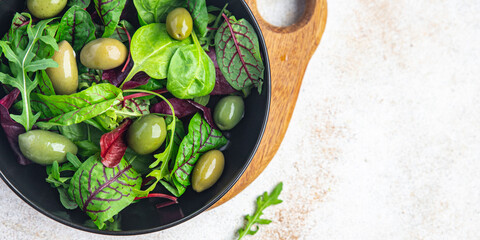 olives green salad fresh portion dietary healthy meal food diet still life snack on the table copy space food background rustic top view keto or paleo diet veggie vegan or vegetarian food