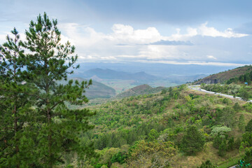 Obraz premium A view of the mountains from the Nossa Senhora Auxiliadora Viewpoint near Eugenio Lefevre train station - Santo Antonio do Pinhal, Brazil
