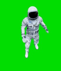 Astronaut isolated on green background.