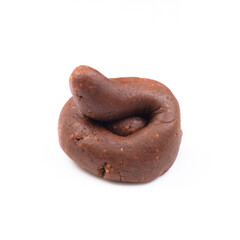Pile of poop made from chilld's sweets snack, molded as a shit, crap, or excretion isolated on white background