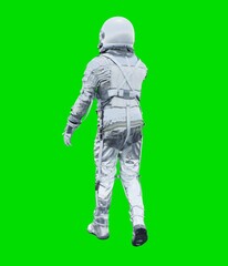 Astronaut isolated on green background.