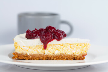Cheesecake on plate with berries on top