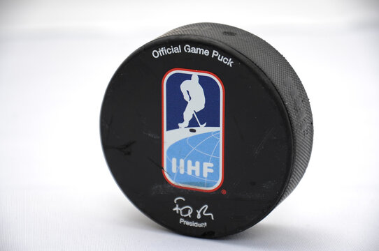 Official IIHF World Championship ice hockey puck with printed IIHF logo