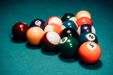 Pool game - balls in triangular shape on a table
