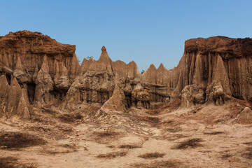 Ancient rock formations in peculiar shapes, in an area known for its excavated Paleolithic relics (Sao Din Na Noi) in Nan Province, Thailand