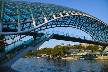 Naklejka premium The Tbilisi Peace Bridge at day with blue sky in Tiblisi, Georgia