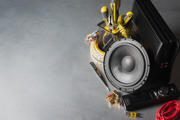 Car audio stereo system equipment on the workbench background with copy space.