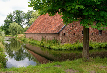 Fototapeta na wymiar Barn from Borggraaf castle in the Dutch village Lottum