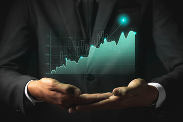 Businessman analyze sales data and graph economic growth. Planning and business strategy Analysis...