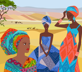 three african lady in colorful dress standing against summer lan